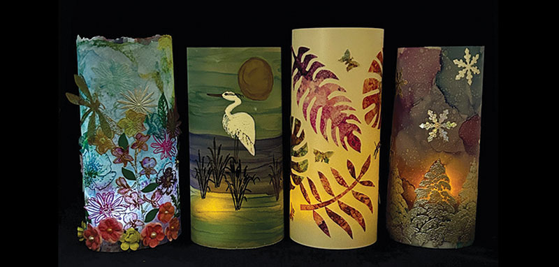 4 luminaries lit up on a black background